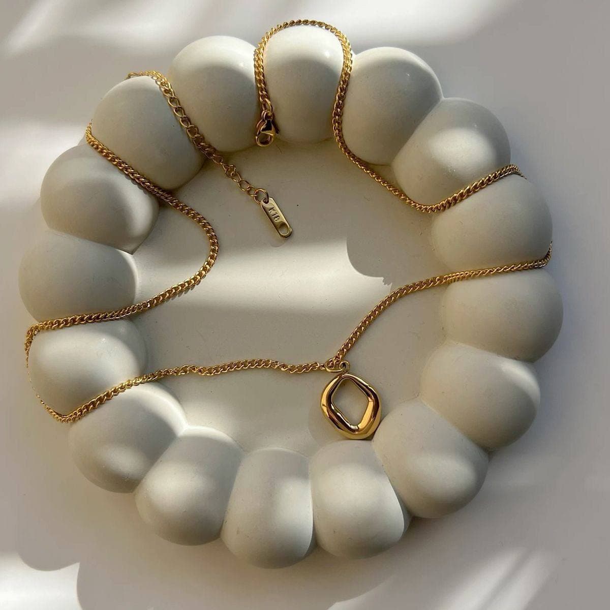 Mbajtëse për aksesorë TESSERA